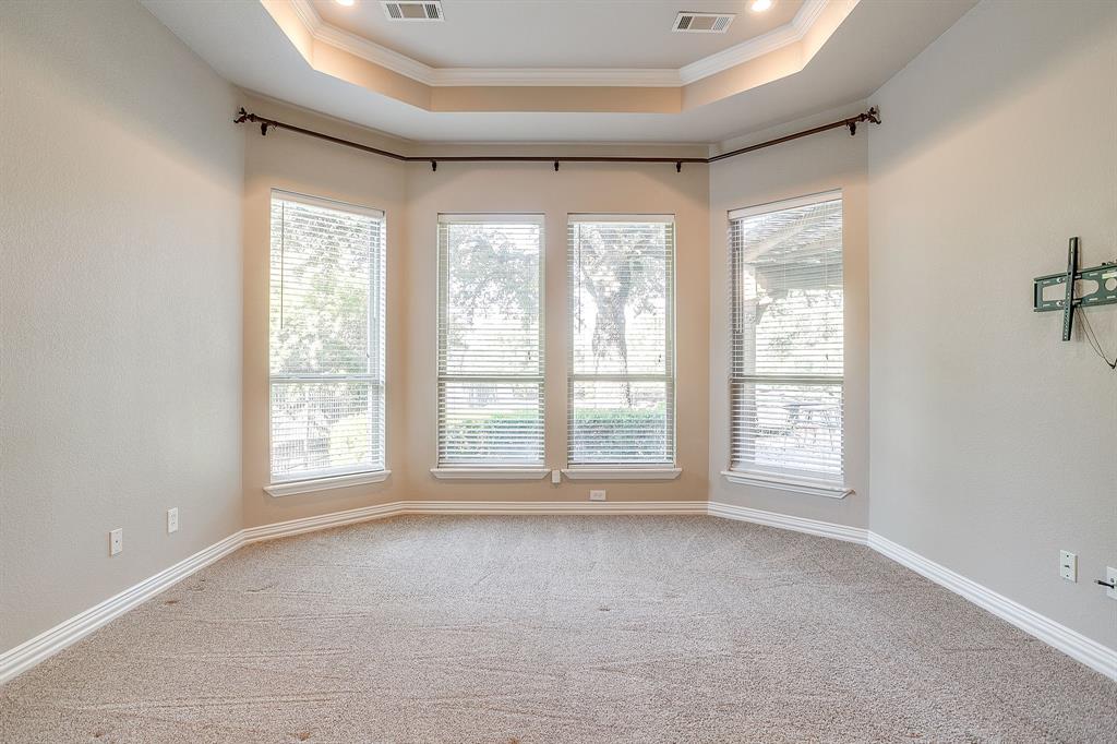 9549 Dickson Road Fort Worth, TX 76179 - Photo 21 of 40 a view of an empty room with a window