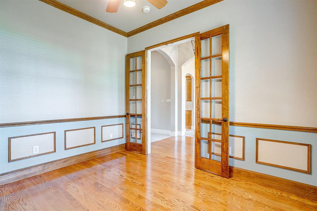 9549 Dickson Road Fort Worth, TX 76179 - Photo 9 of 40 a view of an empty room with glass door