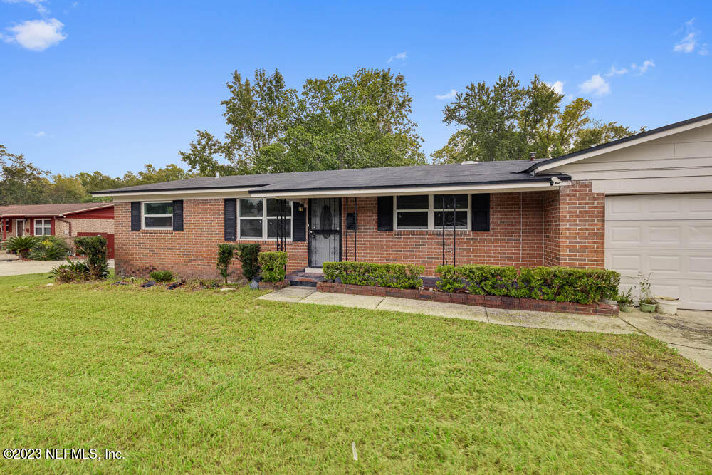 10571 Villanova Road Jacksonville, FL 32218 - Photo 2 of 21 a view of outdoor space yard and deck