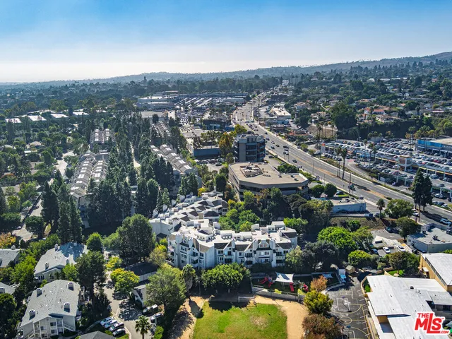 a picture of a room with a white wall and a a white building