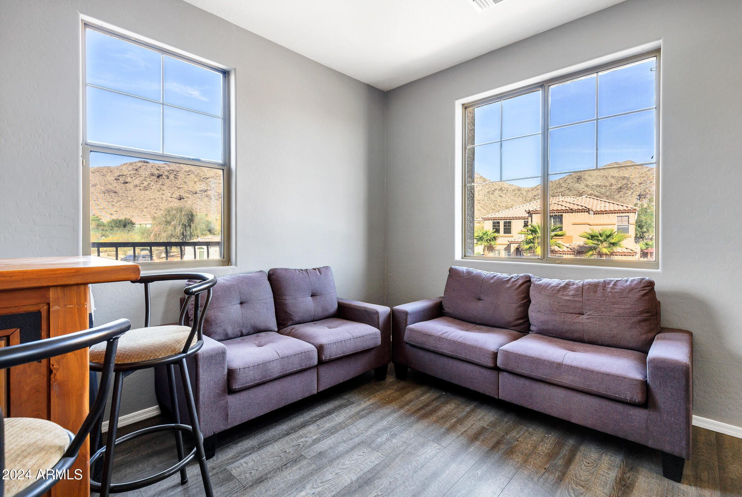 2801 West Silver Fox Way Phoenix, AZ 85045 - Photo 32 of 76 a living room with furniture and a window