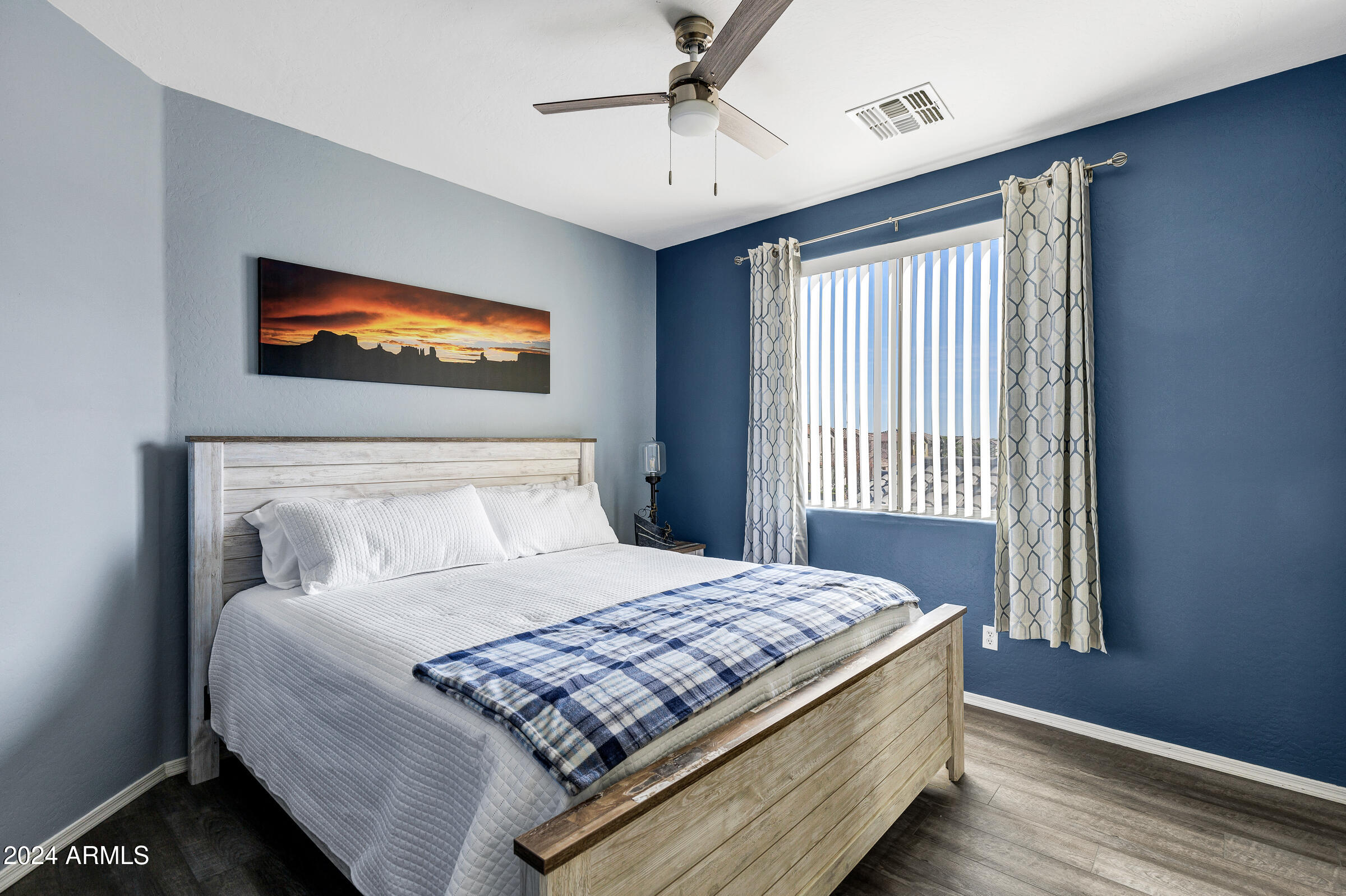 2801 West Silver Fox Way Phoenix, AZ 85045 - Photo 35 of 76 a bedroom with bed and a window