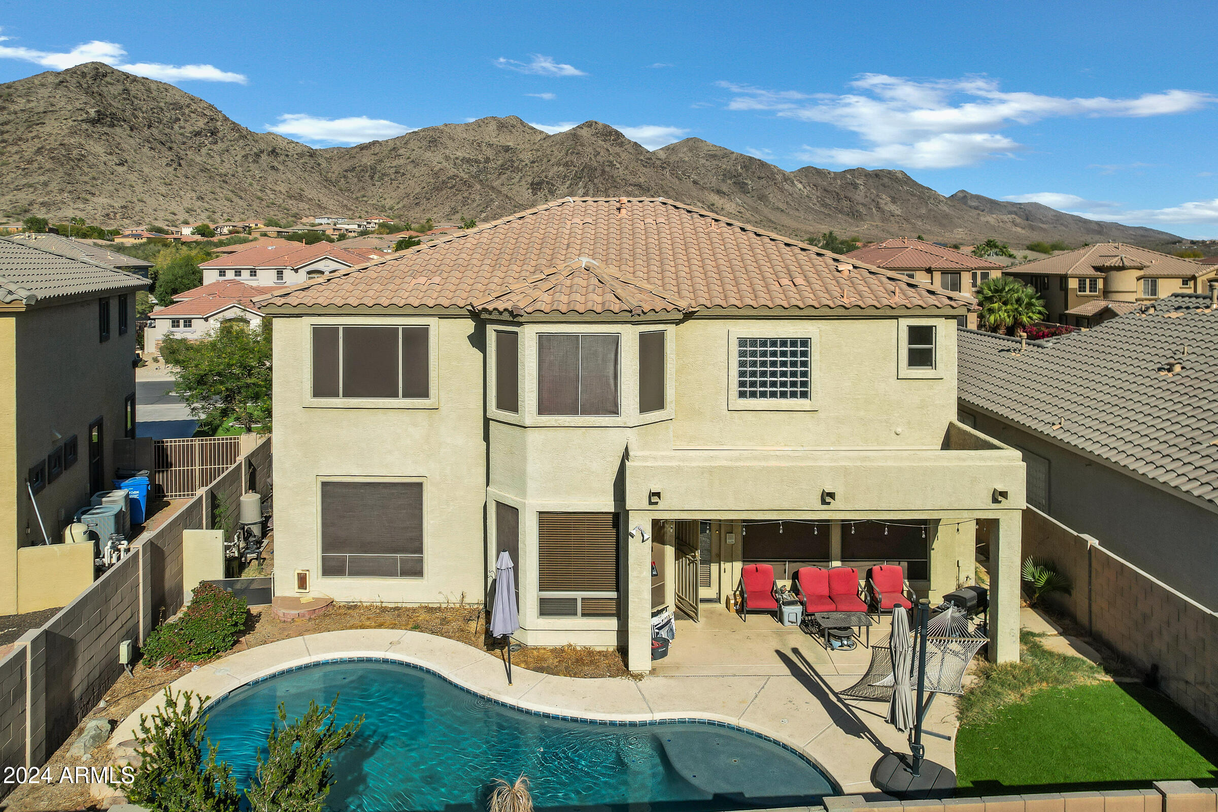 2801 West Silver Fox Way Phoenix, AZ 85045 - Photo 3 of 76 a view of a house with a backyard and a tub