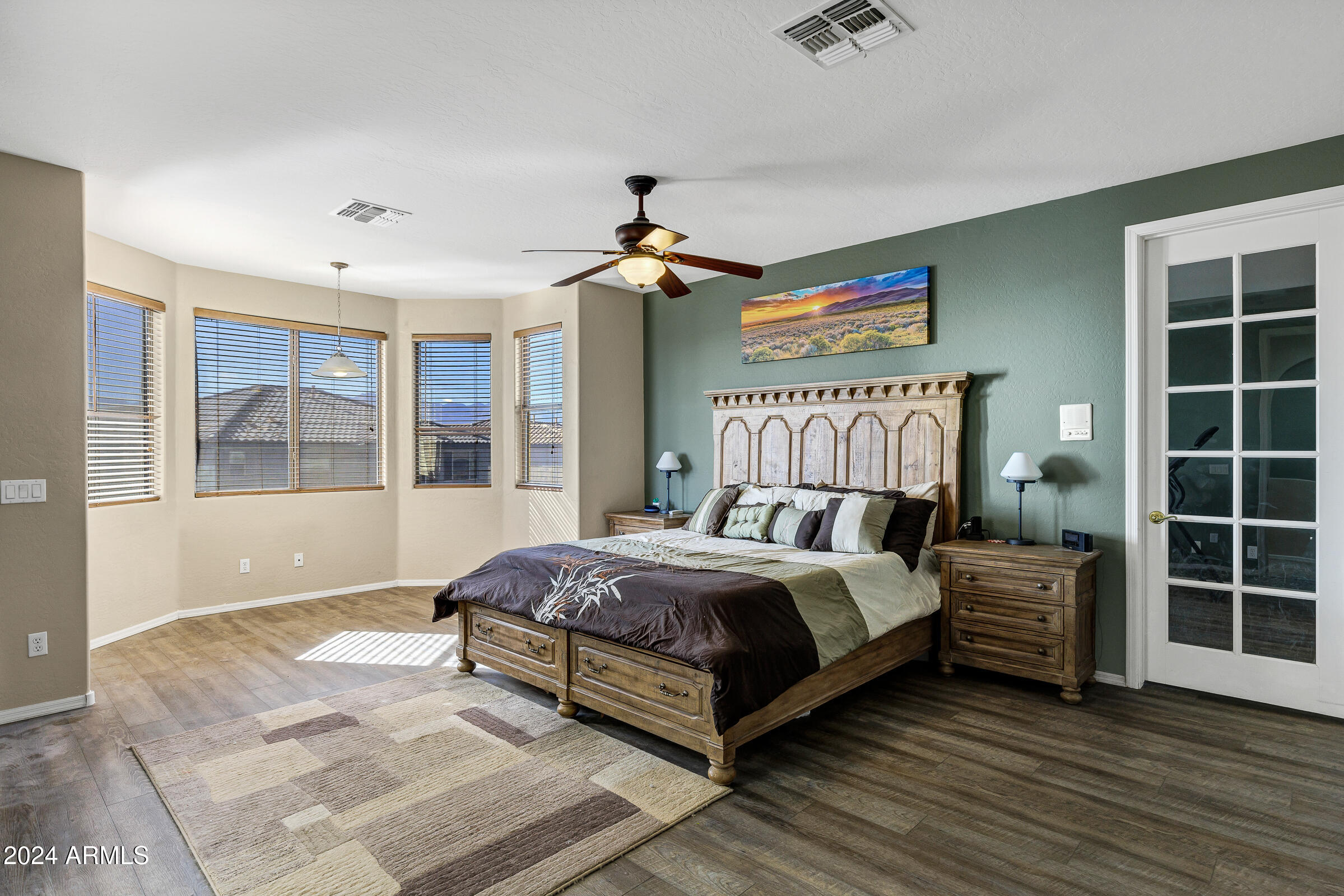 2801 West Silver Fox Way Phoenix, AZ 85045 - Photo 43 of 76 a bedroom with a large bed and a window