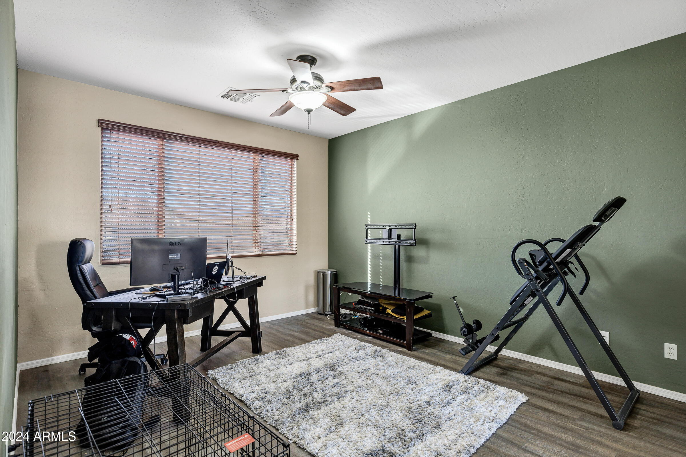 2801 West Silver Fox Way Phoenix, AZ 85045 - Photo 51 of 76 a view of a workspace with furniture and a window