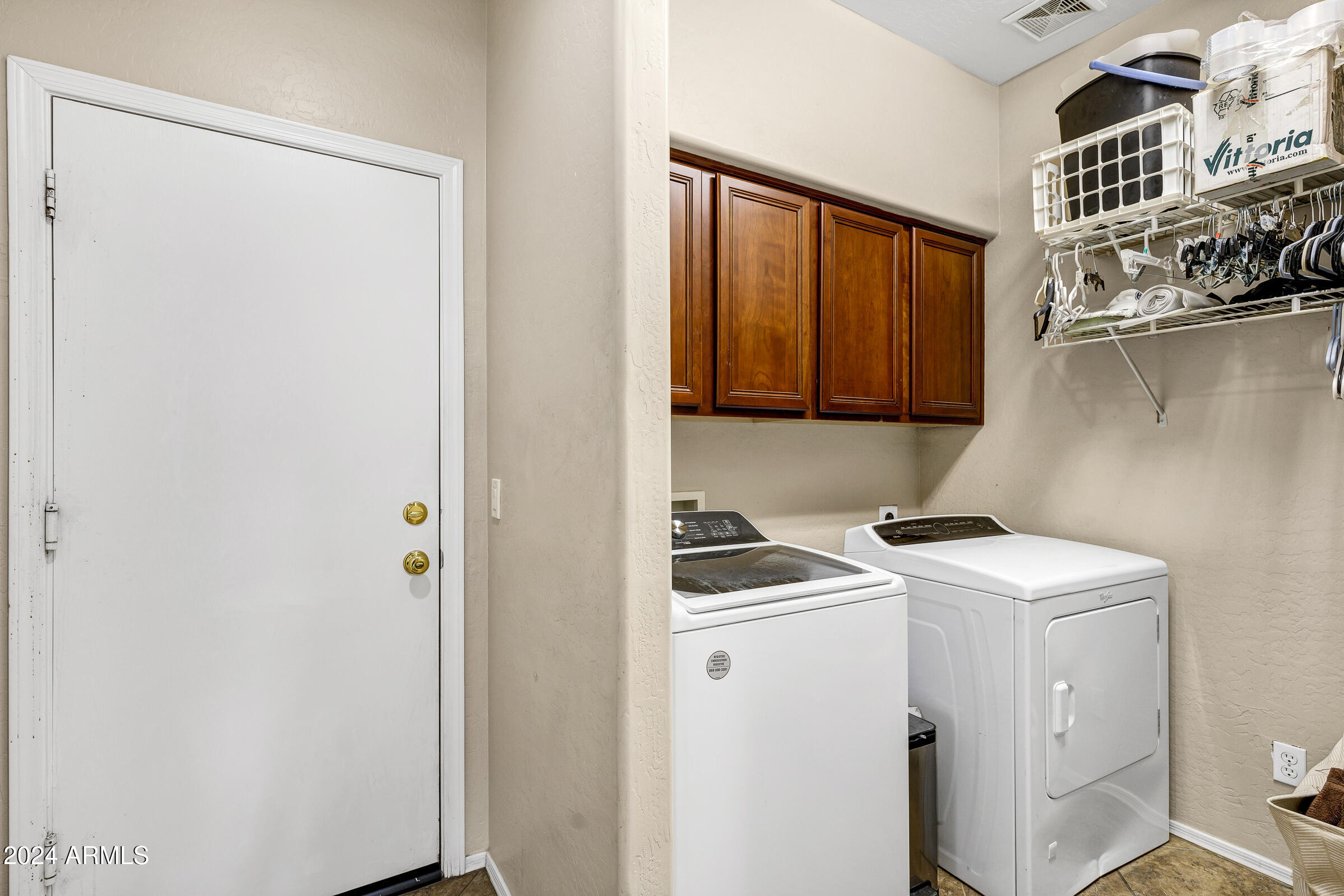 2801 West Silver Fox Way Phoenix, AZ 85045 - Photo 54 of 76 a room with storage and utility