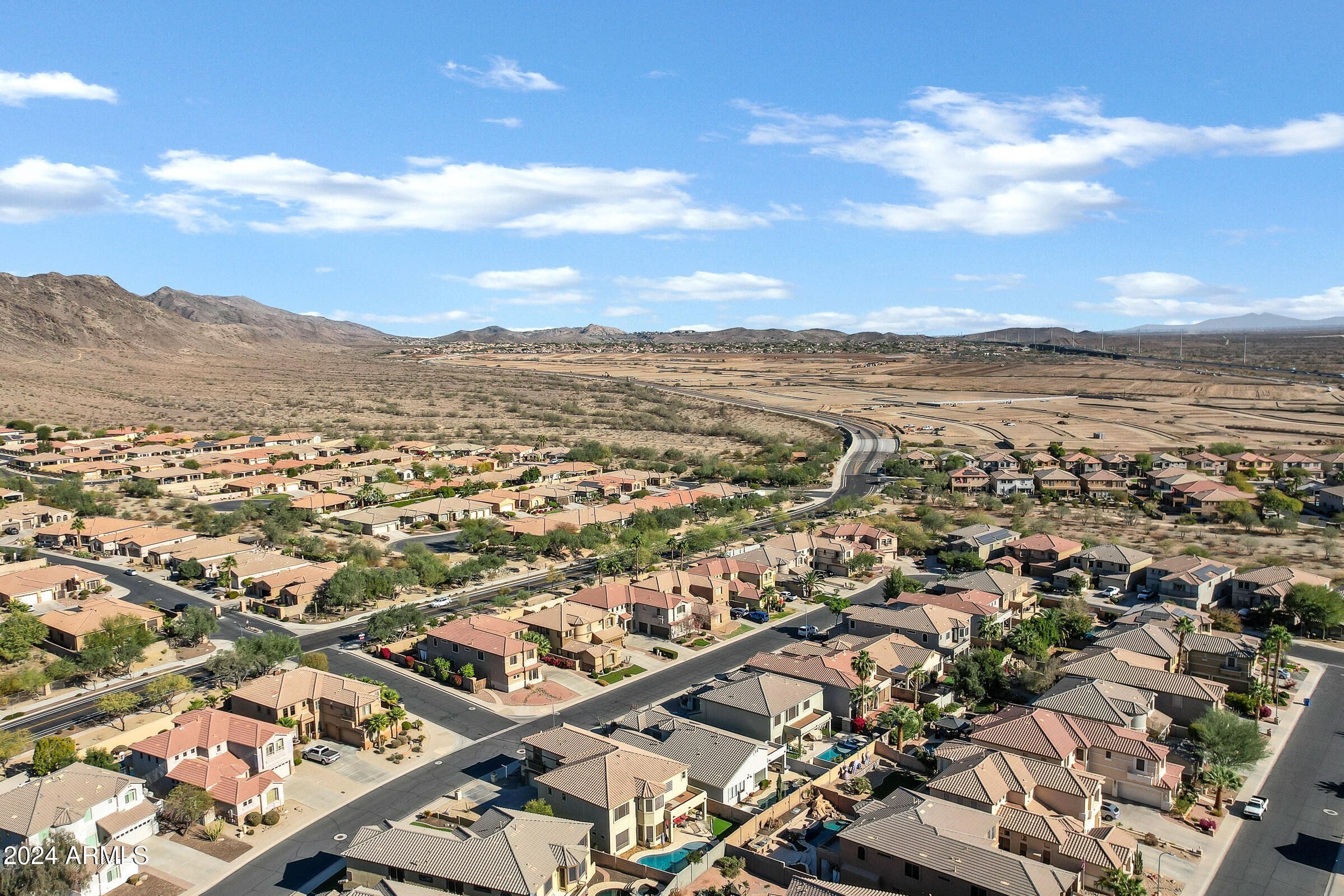 2801 West Silver Fox Way Phoenix, AZ 85045 - Photo 73 of 76 an aerial view of residential building with parking space
