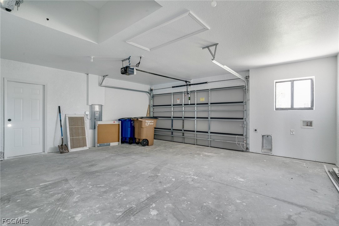 4725-4727 27th Street Southwest, Unit 4725 Lehigh Acres, FL 33973 - Photo 20 of 22 a view of a garage room