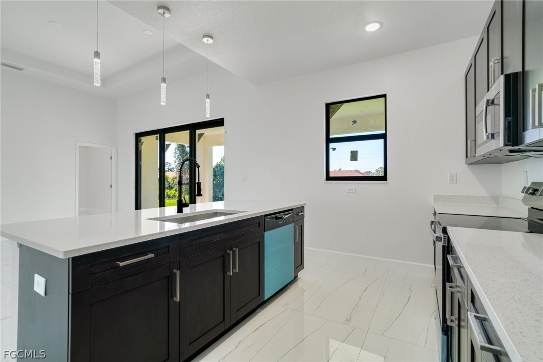 4725-4727 27th Street Southwest, Unit 4725 Lehigh Acres, FL 33973 - Photo 4 of 22 a bathroom with a sink and a mirror