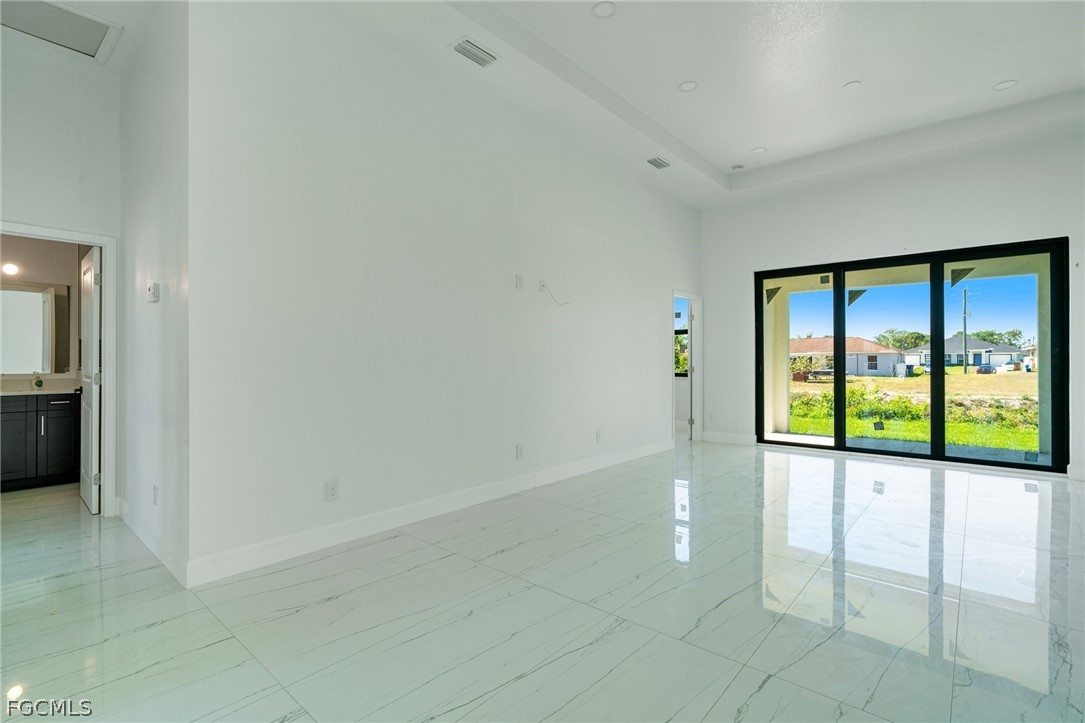 4725-4727 27th Street Southwest, Unit 4725 Lehigh Acres, FL 33973 - Photo 7 of 22 a view of a hallway with a window