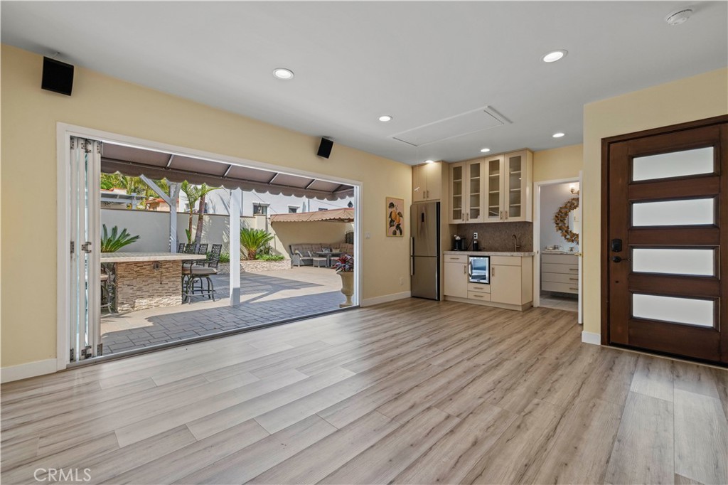 645 Glenmore Boulevard Glendale, CA 91206 - Photo 30 of 34 a view of a big room with wooden floor and windows
