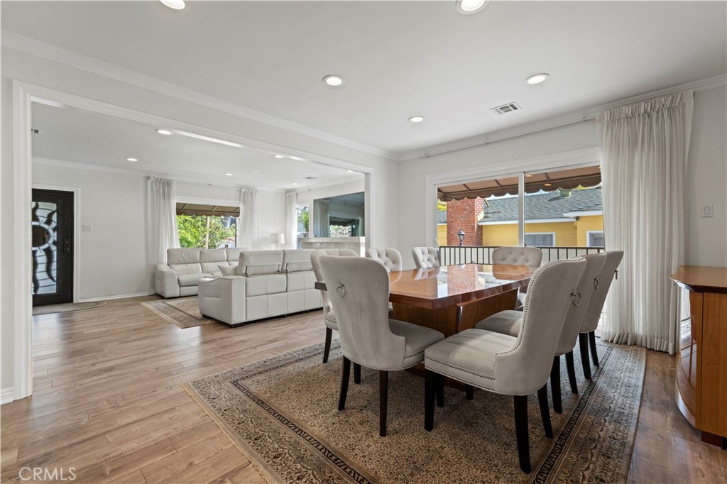 645 Glenmore Boulevard Glendale, CA 91206 - Photo 7 of 34 a view of a dining room with furniture window and wooden floor