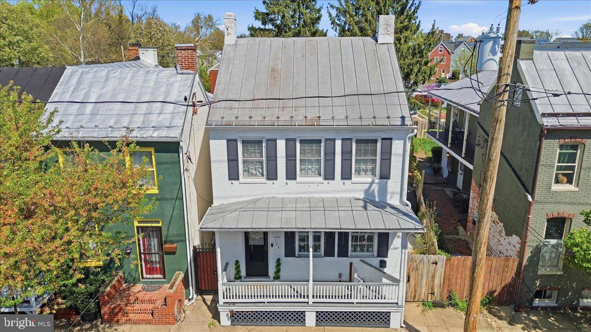 123 West 5th Street Frederick, MD 21701 - Photo 35 of 44 a aerial view of a residential apartment building with a yard