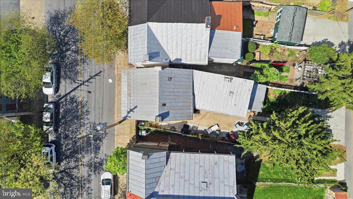 123 West 5th Street Frederick, MD 21701 - Photo 38 of 44 an aerial view of a house with a yard and large trees