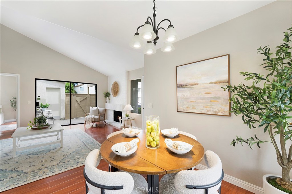 242 Mountain Court Brea, CA 92821 - Photo 11 of 54 a view of a dining room with furniture window and wooden floor