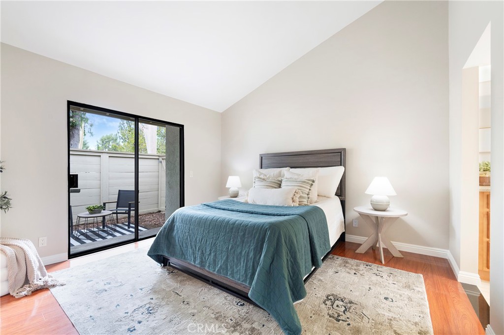 242 Mountain Court Brea, CA 92821 - Photo 20 of 54 a bedroom with a large bed and a window