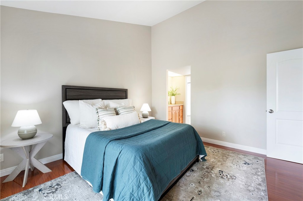 242 Mountain Court Brea, CA 92821 - Photo 22 of 54 a bedroom with a bed and wooden floor