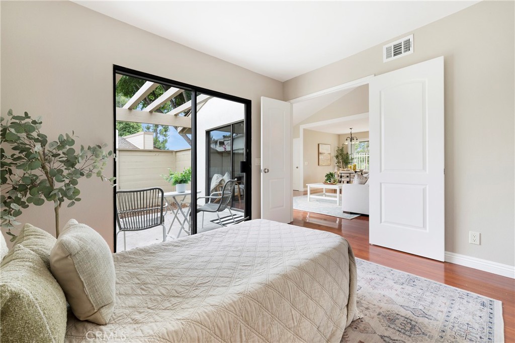 242 Mountain Court Brea, CA 92821 - Photo 28 of 54 a bedroom with a bed and a large window