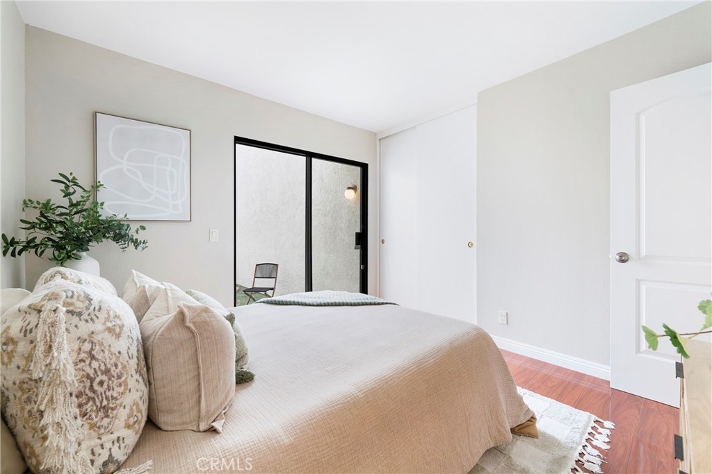 242 Mountain Court Brea, CA 92821 - Photo 35 of 54 a bedroom with a bed and a potted plant