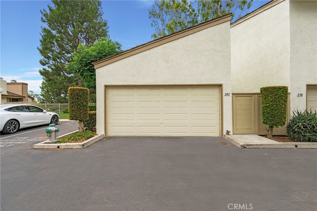 242 Mountain Court Brea, CA 92821 - Photo 39 of 54 a view of a street with a car parked