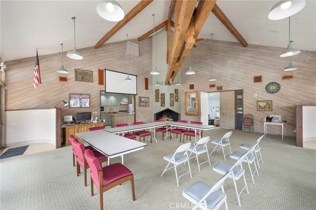 242 Mountain Court Brea, CA 92821 - Photo 46 of 54 a view of a dining room with furniture and a chandelier