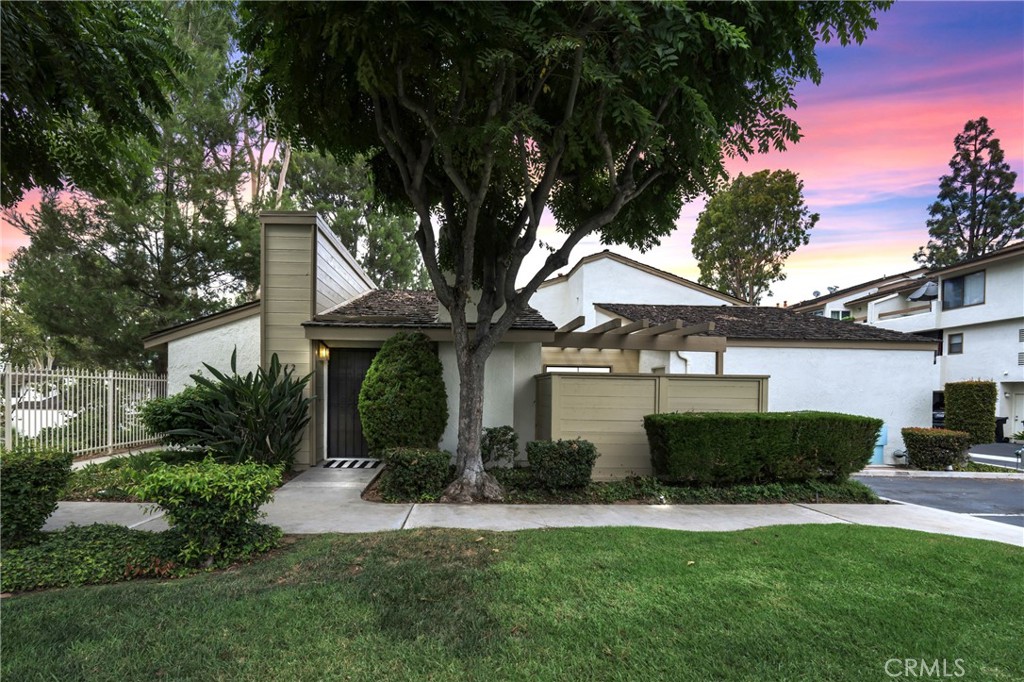 242 Mountain Court Brea, CA 92821 - Photo 54 of 54 a front view of a house with a yard and garage