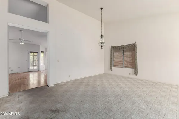 a view of empty room with windows