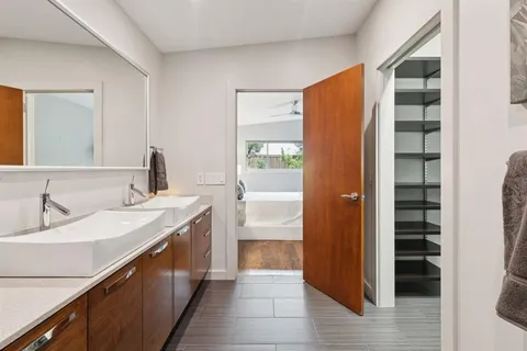 a kitchen with a sink and a refrigerator