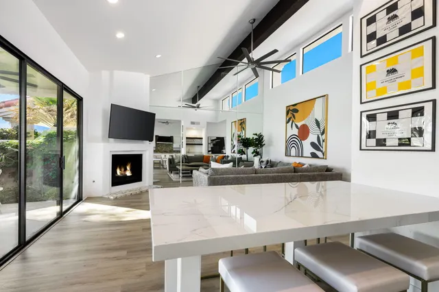 a view of a kitchen with furniture and a fireplace
