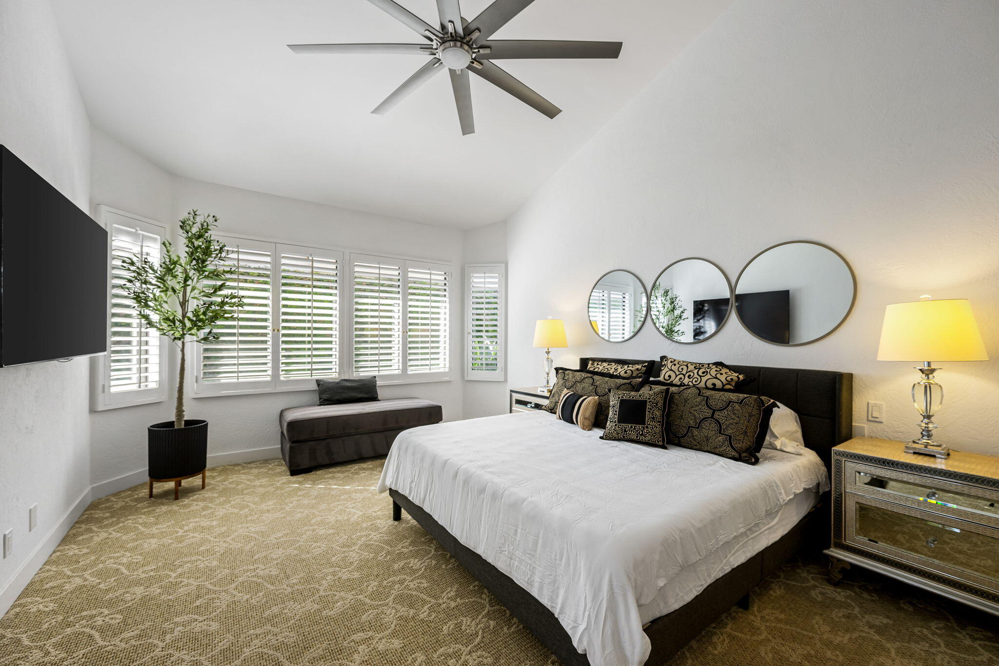 54524 Inverness Way La Quinta, CA 92253 - Photo 26 of 48 a bedroom with bed and a flat tv screen on dresser