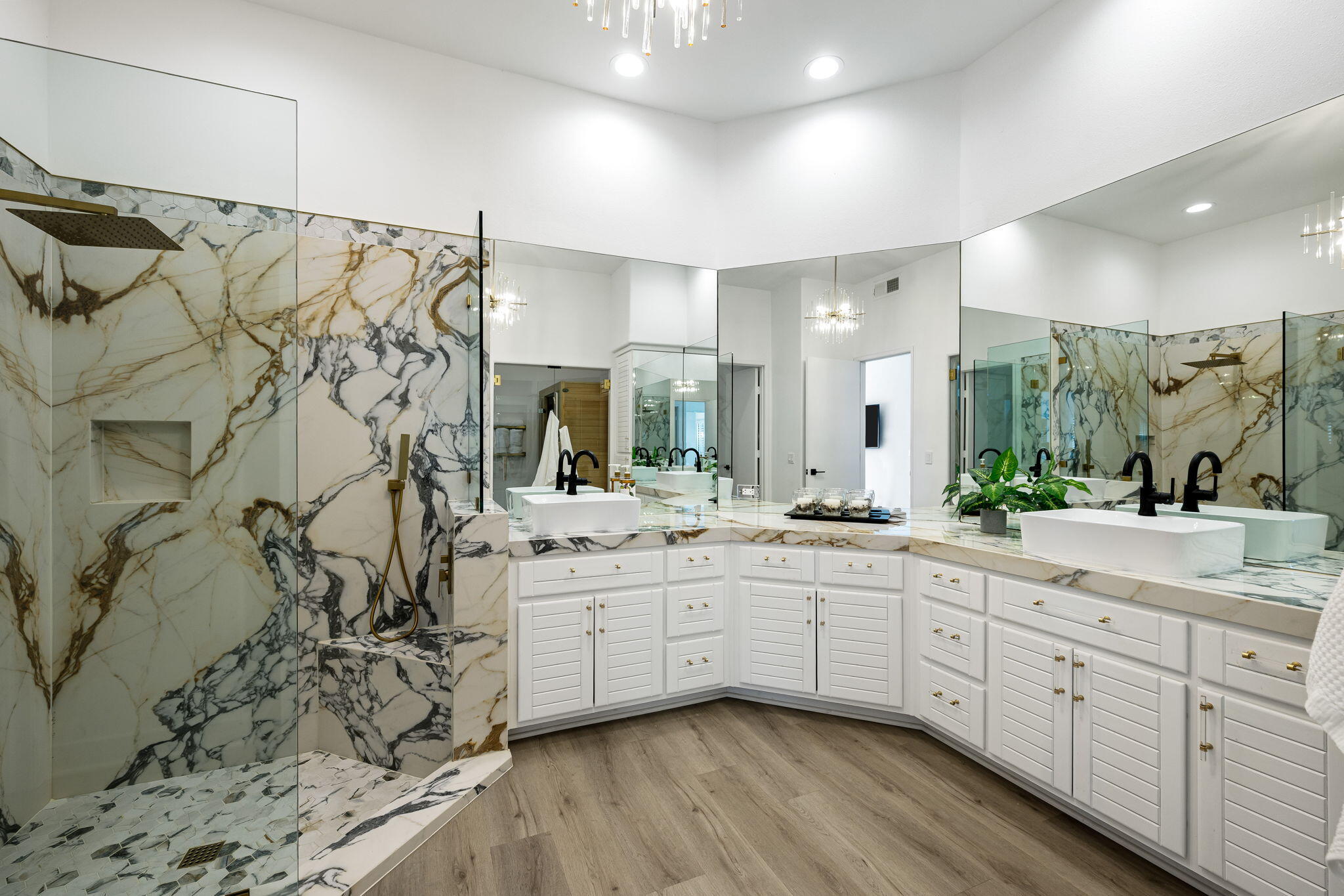 54524 Inverness Way La Quinta, CA 92253 - Photo 30 of 48 a spacious bathroom with a double vanity sink a mirror and a shower