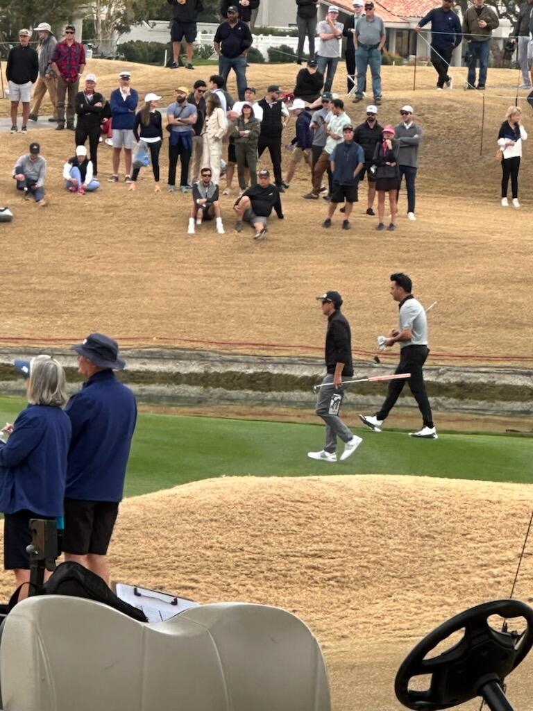 54524 Inverness Way La Quinta, CA 92253 - Photo 47 of 48 a group of people sitting on top of a park