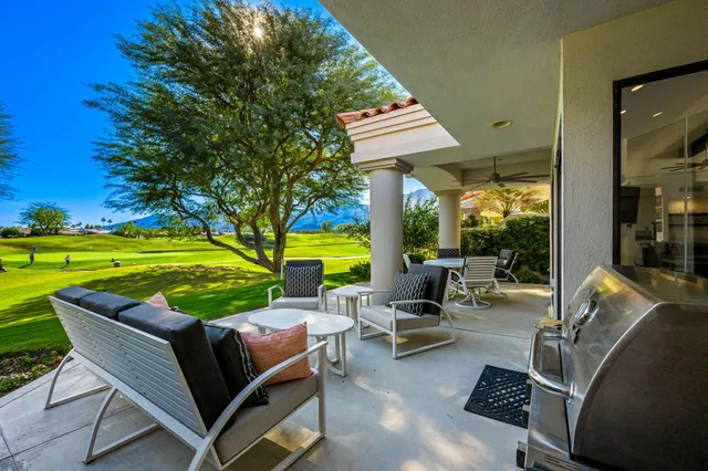 a view of a patio with swimming pool