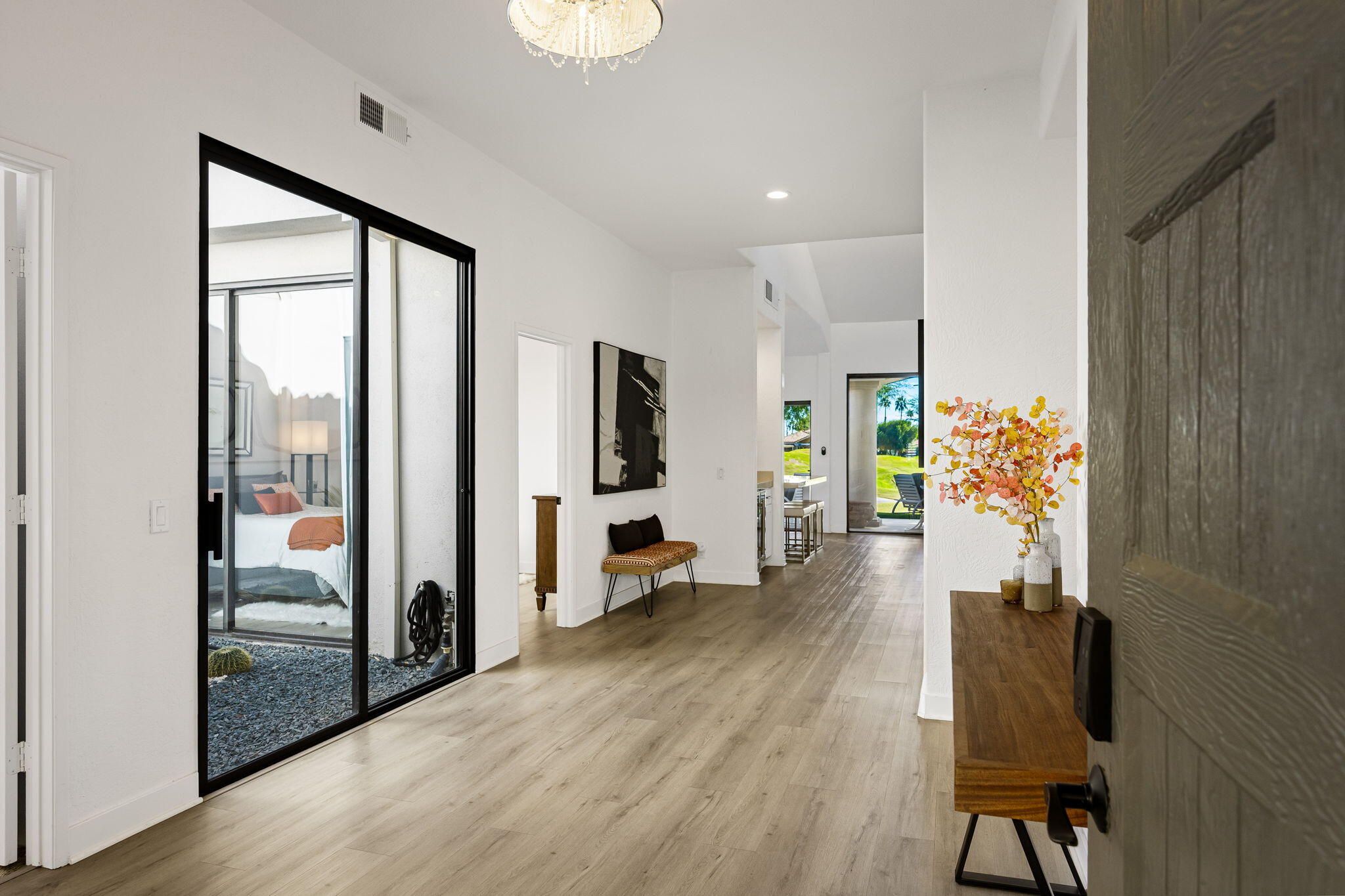 54524 Inverness Way La Quinta, CA 92253 - Photo 9 of 48 a view of an entryway with wooden floor and a livingroom view