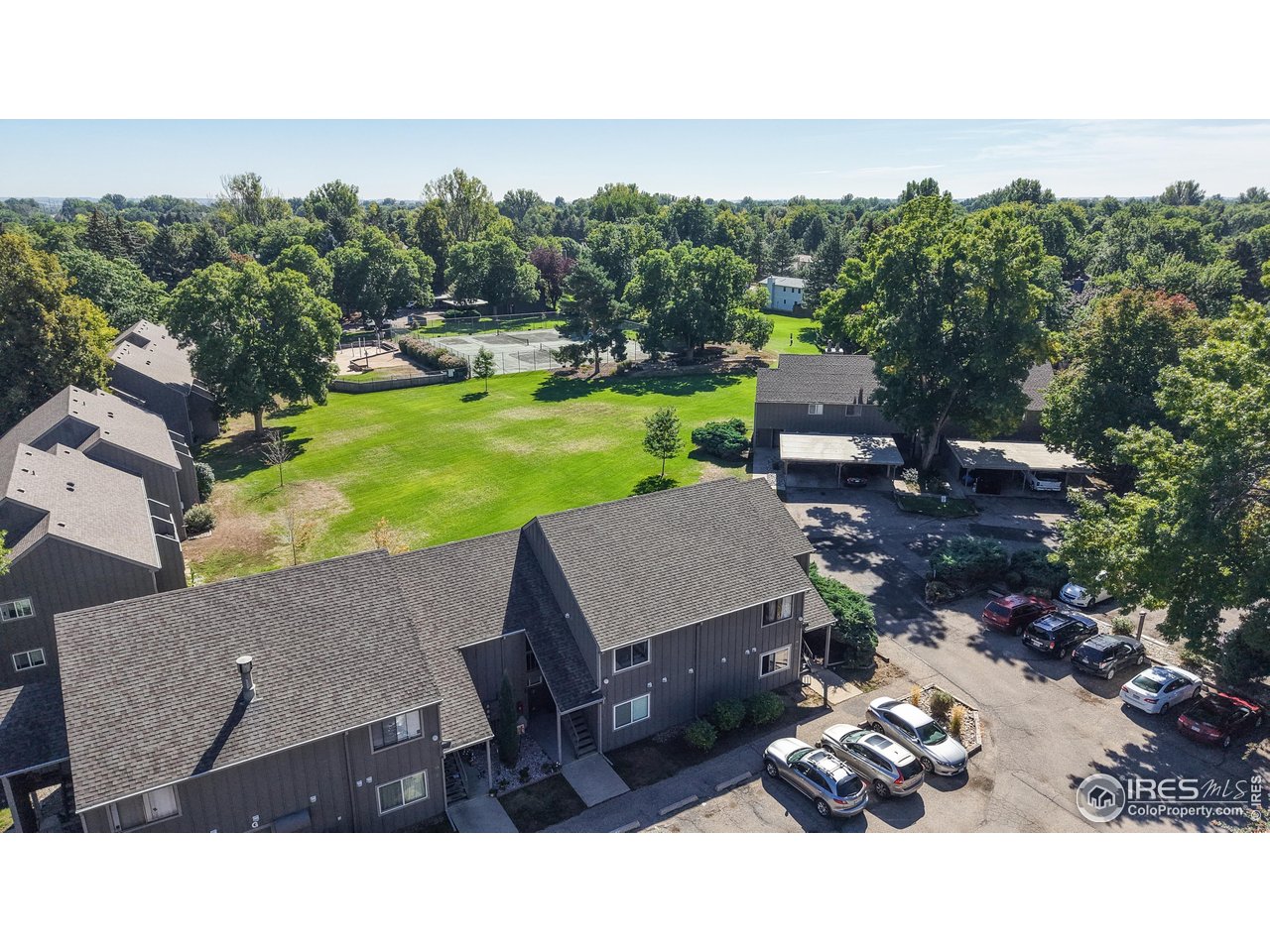 801 East Drake Road, Unit 80 Fort Collins, CO 80525 - Photo 21 of 25 Park like area behind the home