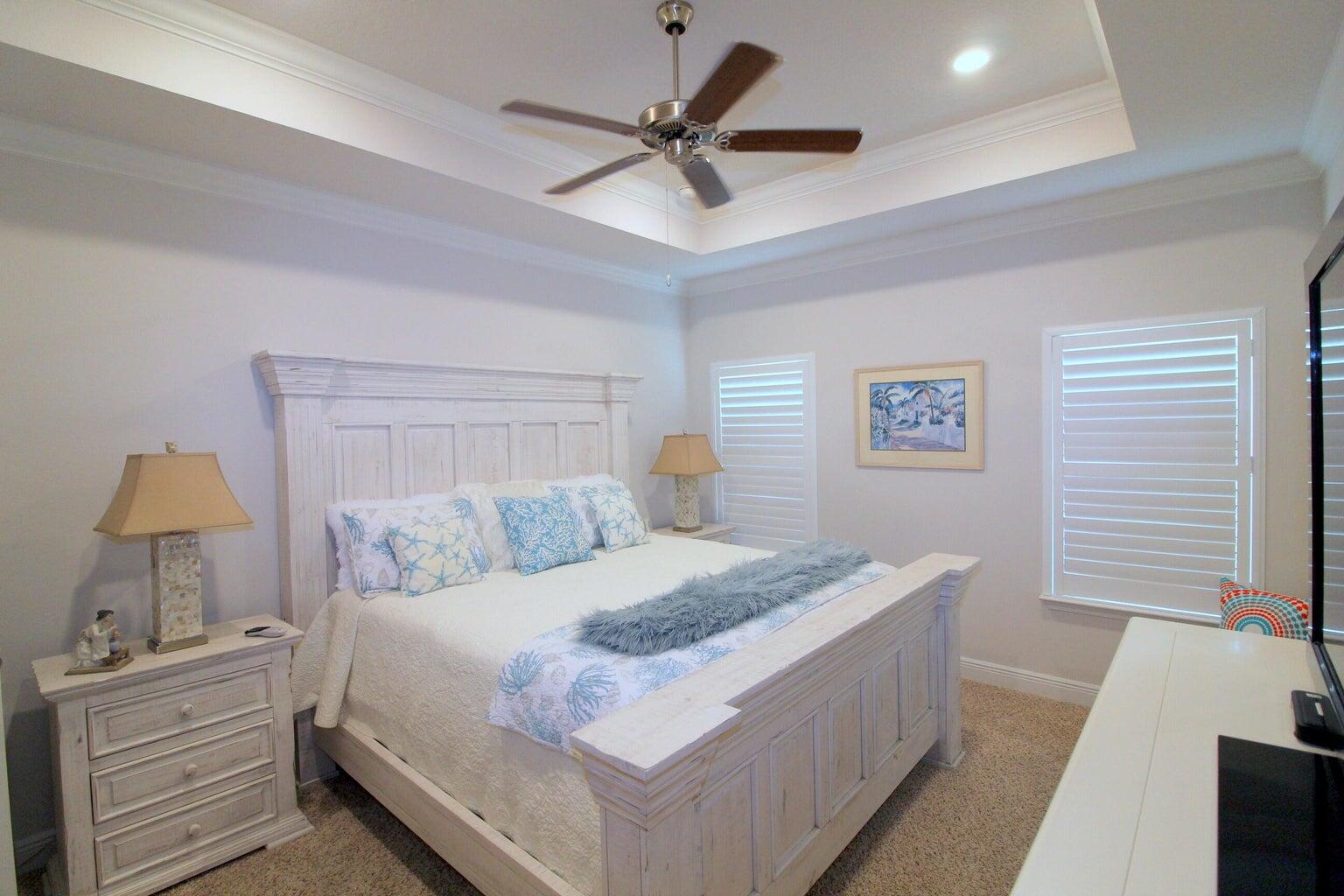 454 Lightning Bug Lane Freeport, FL 32439 - Photo 15 of 41 a bedroom with a bed and a table
