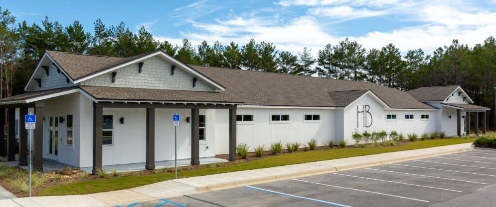 454 Lightning Bug Lane Freeport, FL 32439 - Photo 36 of 41 a front view of a house with garden