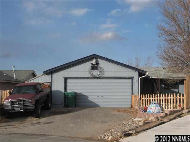 16045 Tourmaline Drive Reno, NV 89521 - Photo 1 of 1 a view of parking area and car parked
