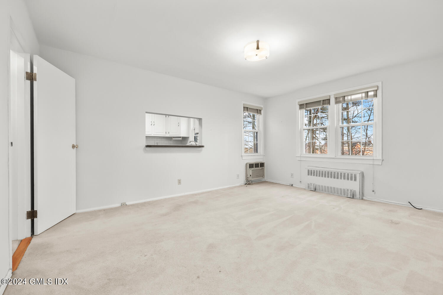 160 Putnam Park Greenwich, CT 06830 - Photo 13 of 27 a view of an empty room with a window