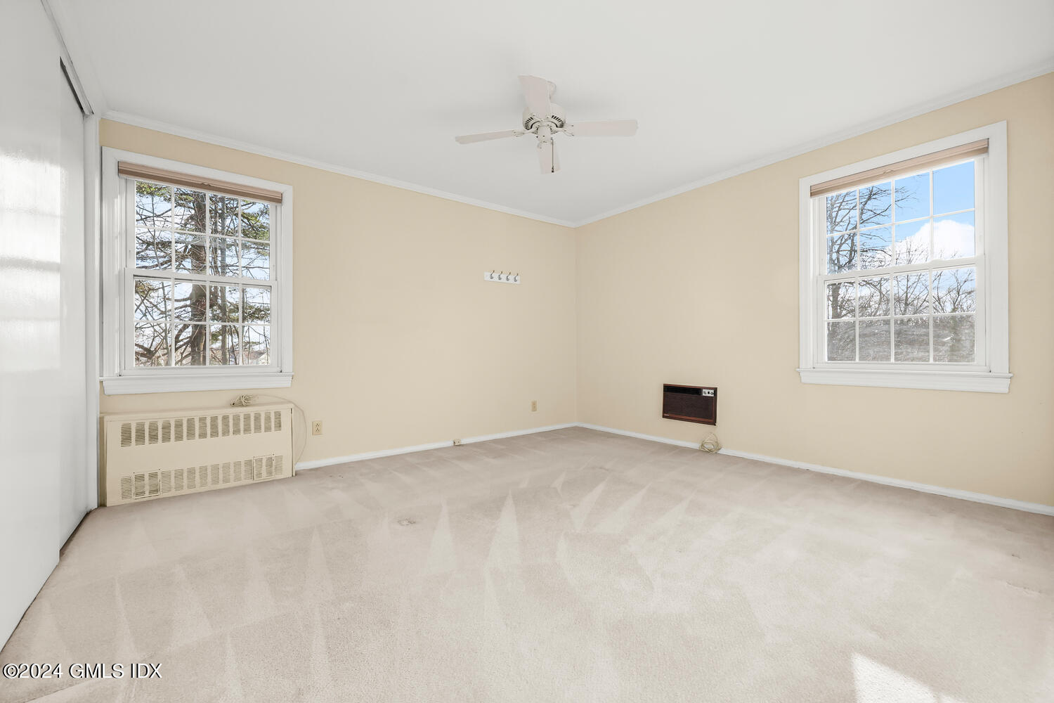 160 Putnam Park Greenwich, CT 06830 - Photo 18 of 27 a view of an empty room with a window