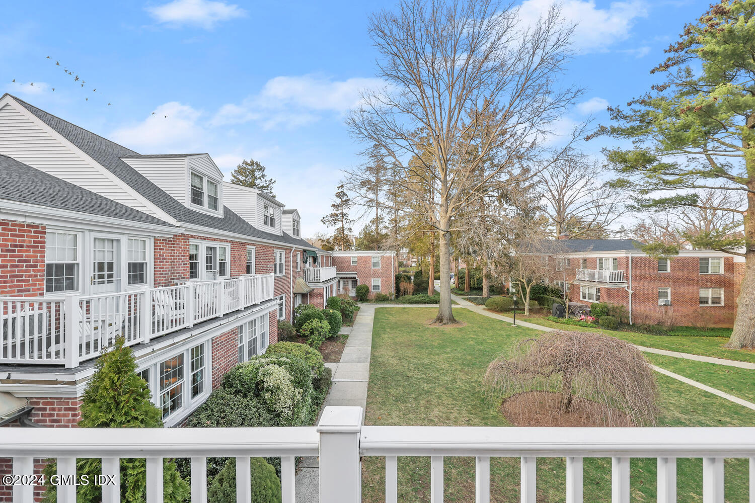 160 Putnam Park Greenwich, CT 06830 - Photo 21 of 27 a view of a house with a yard