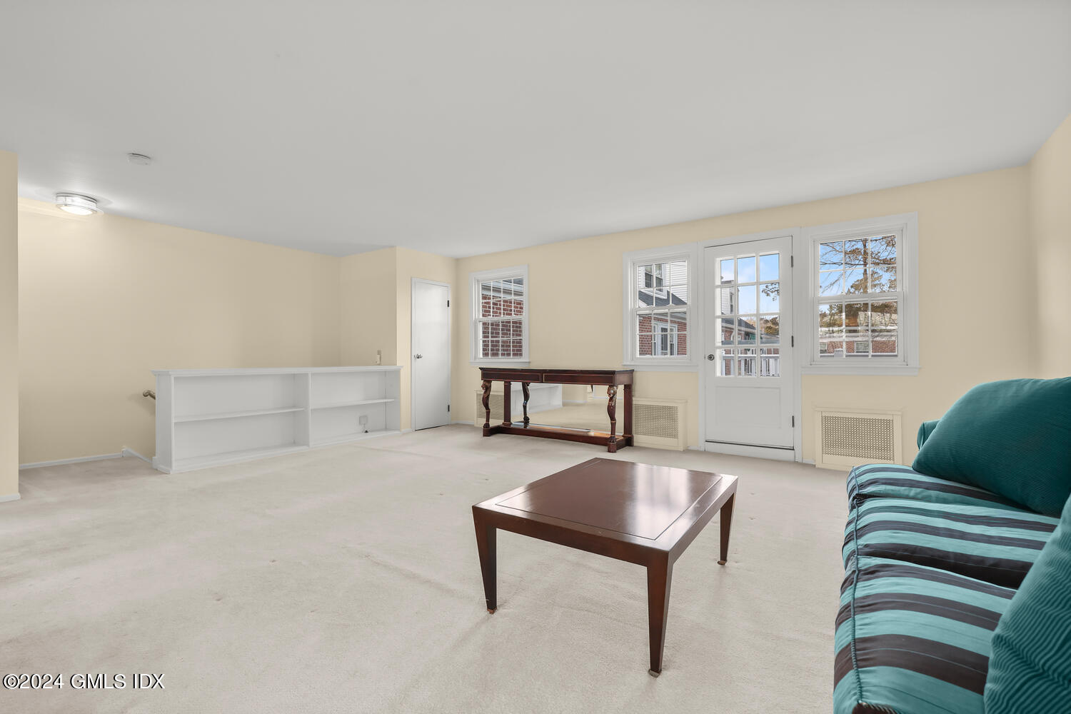 160 Putnam Park Greenwich, CT 06830 - Photo 6 of 27 a living room with furniture and a table