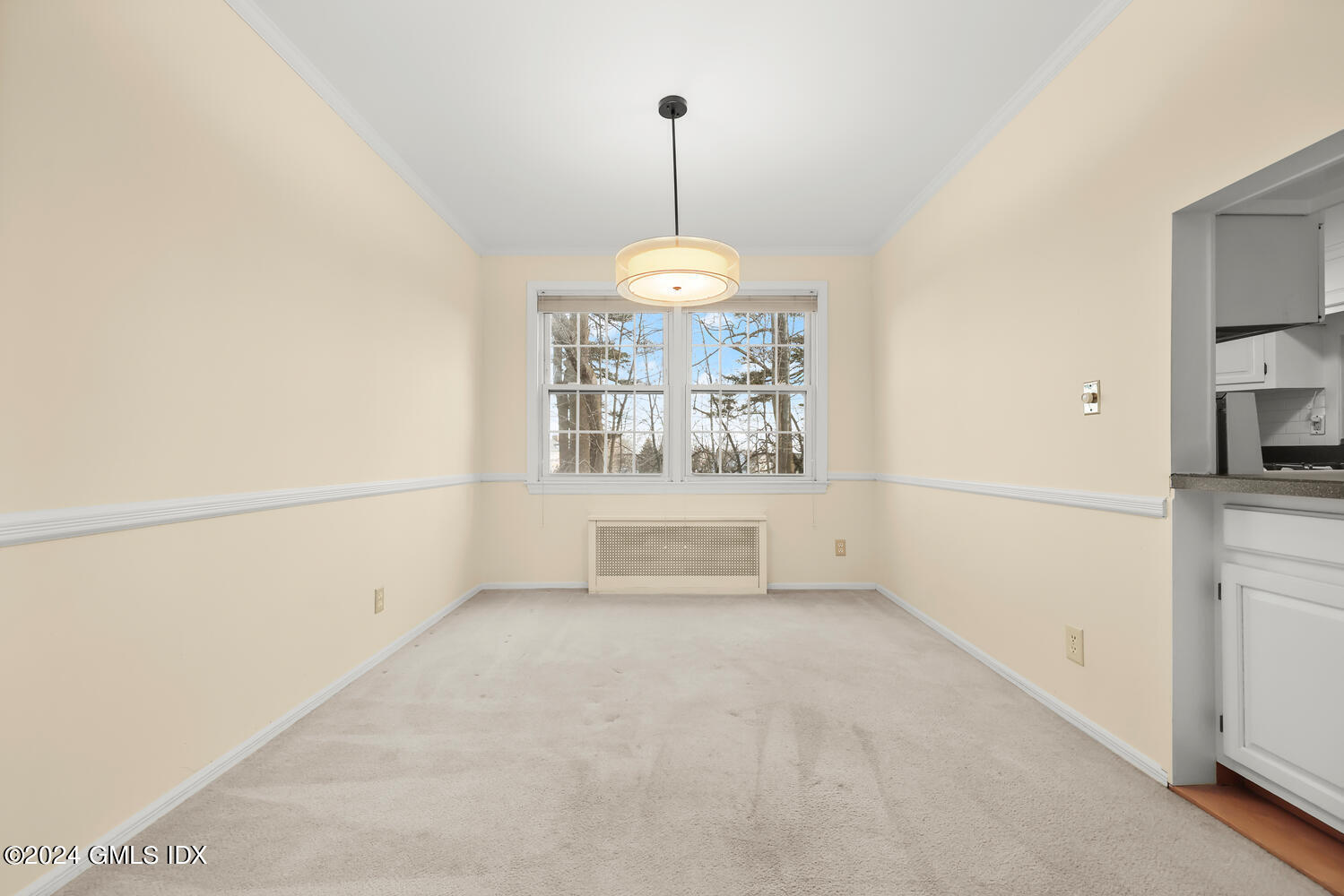 160 Putnam Park Greenwich, CT 06830 - Photo 10 of 27 a room with a window and a chandelier