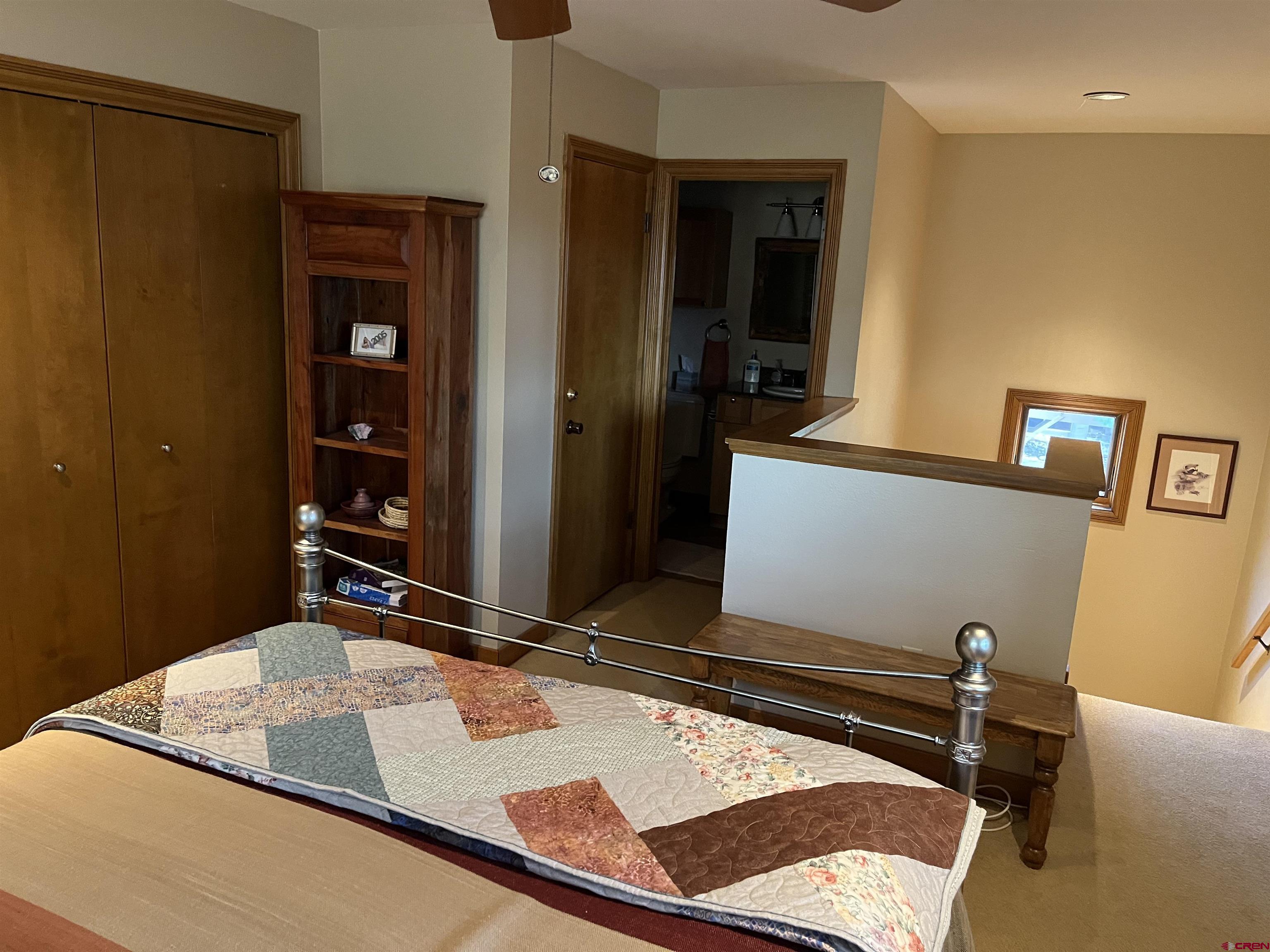 6 Ferringway Circle, Unit 22 Durango, CO 81301 - Photo 11 of 15 a room with gym equipment and a mirror