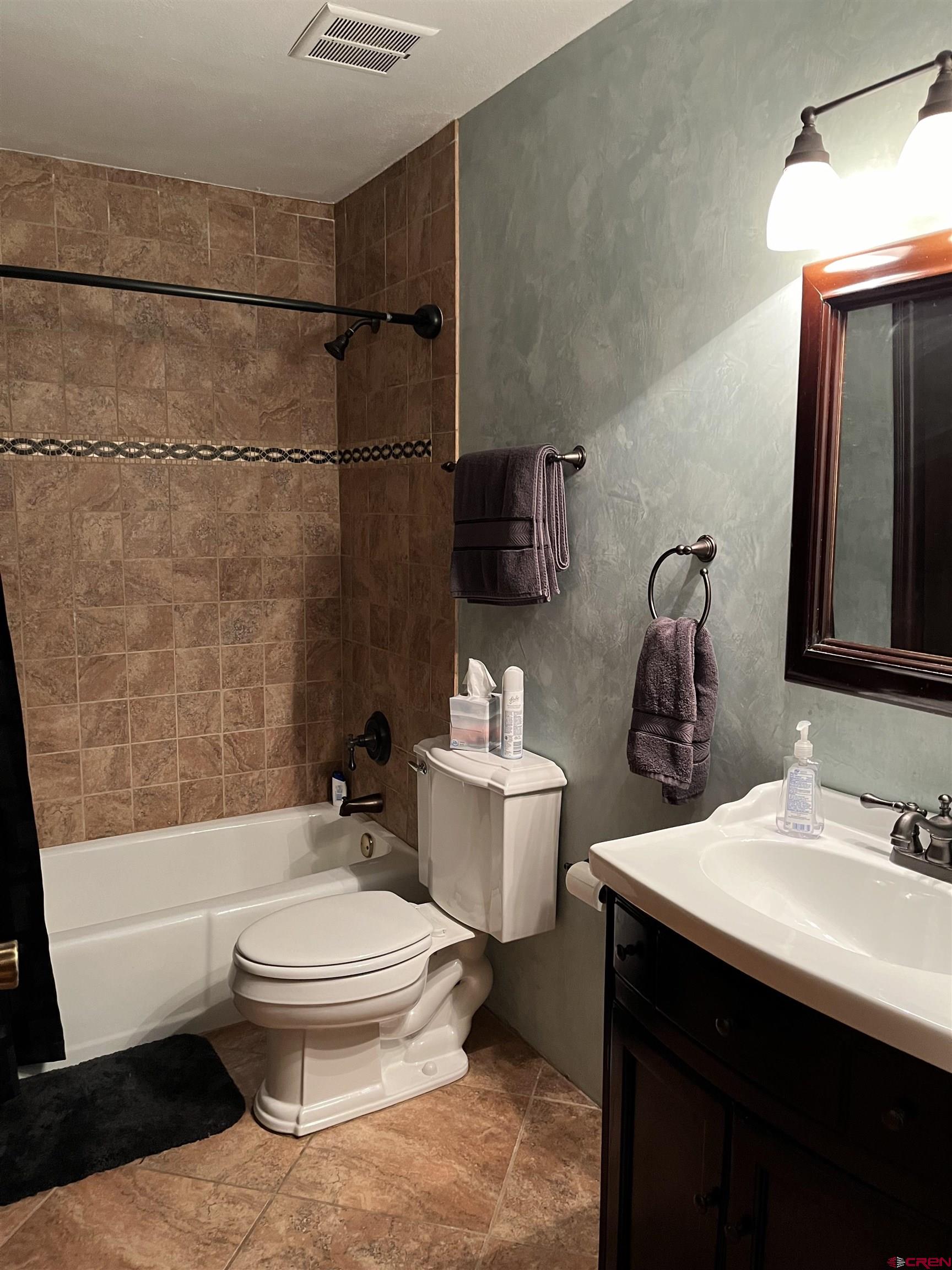 6 Ferringway Circle, Unit 22 Durango, CO 81301 - Photo 9 of 15 a bathroom with a sink toilet and shower