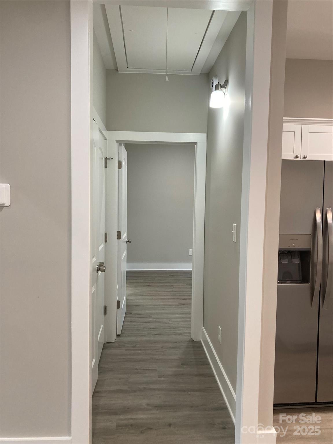 318 Davis Park Road Gastonia, NC 28052 - Photo 14 of 24 a view of a hallway with wooden floor and staircase