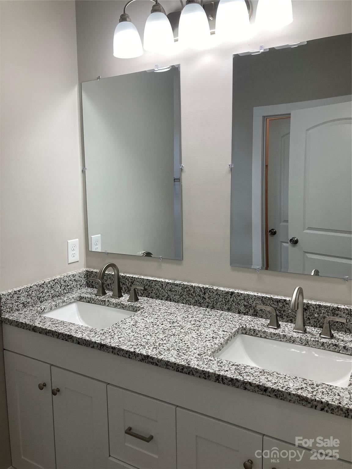 318 Davis Park Road Gastonia, NC 28052 - Photo 17 of 24 a bathroom with a granite countertop sink and a mirror