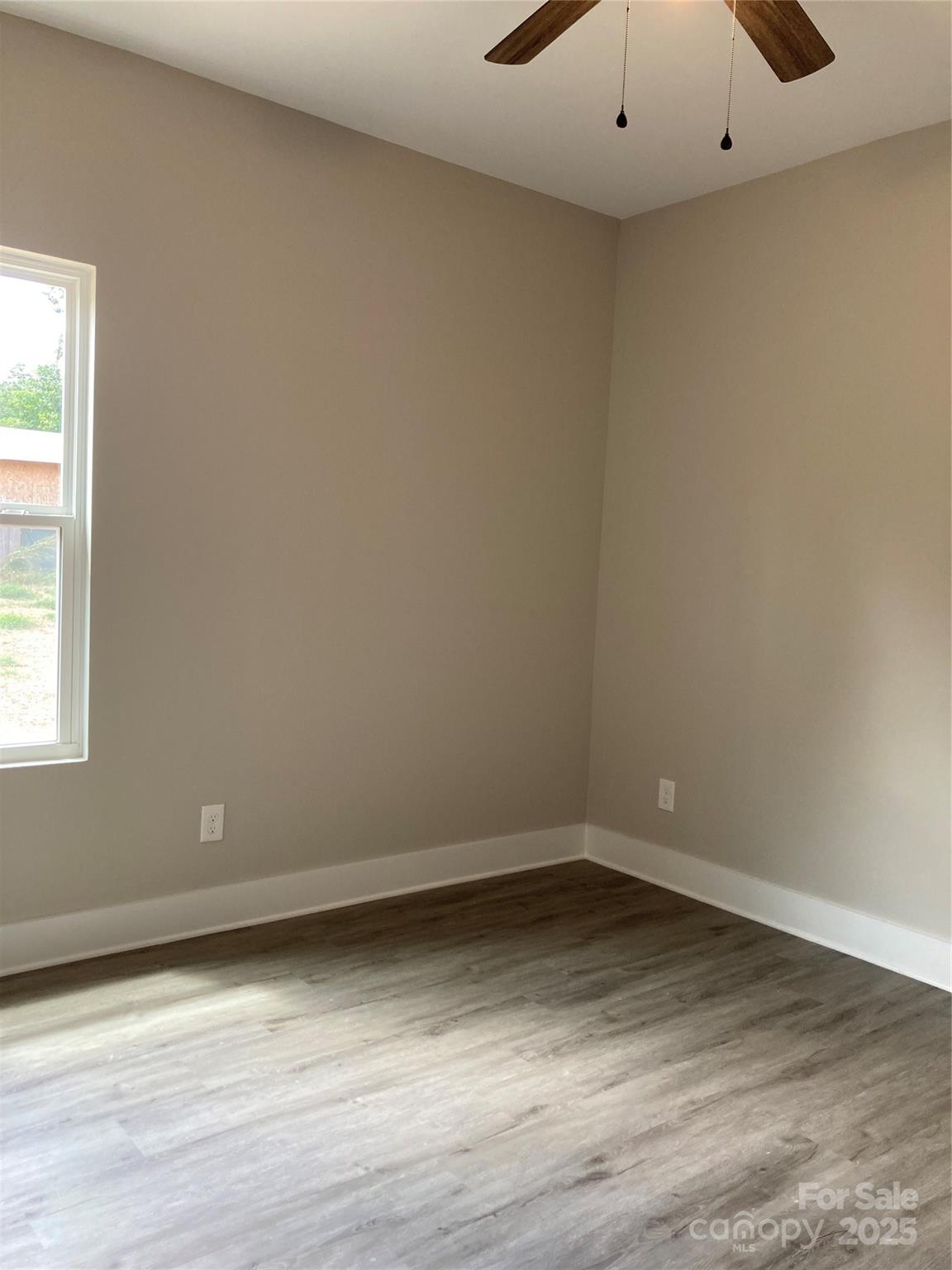318 Davis Park Road Gastonia, NC 28052 - Photo 21 of 24 a view of a room with wooden floor