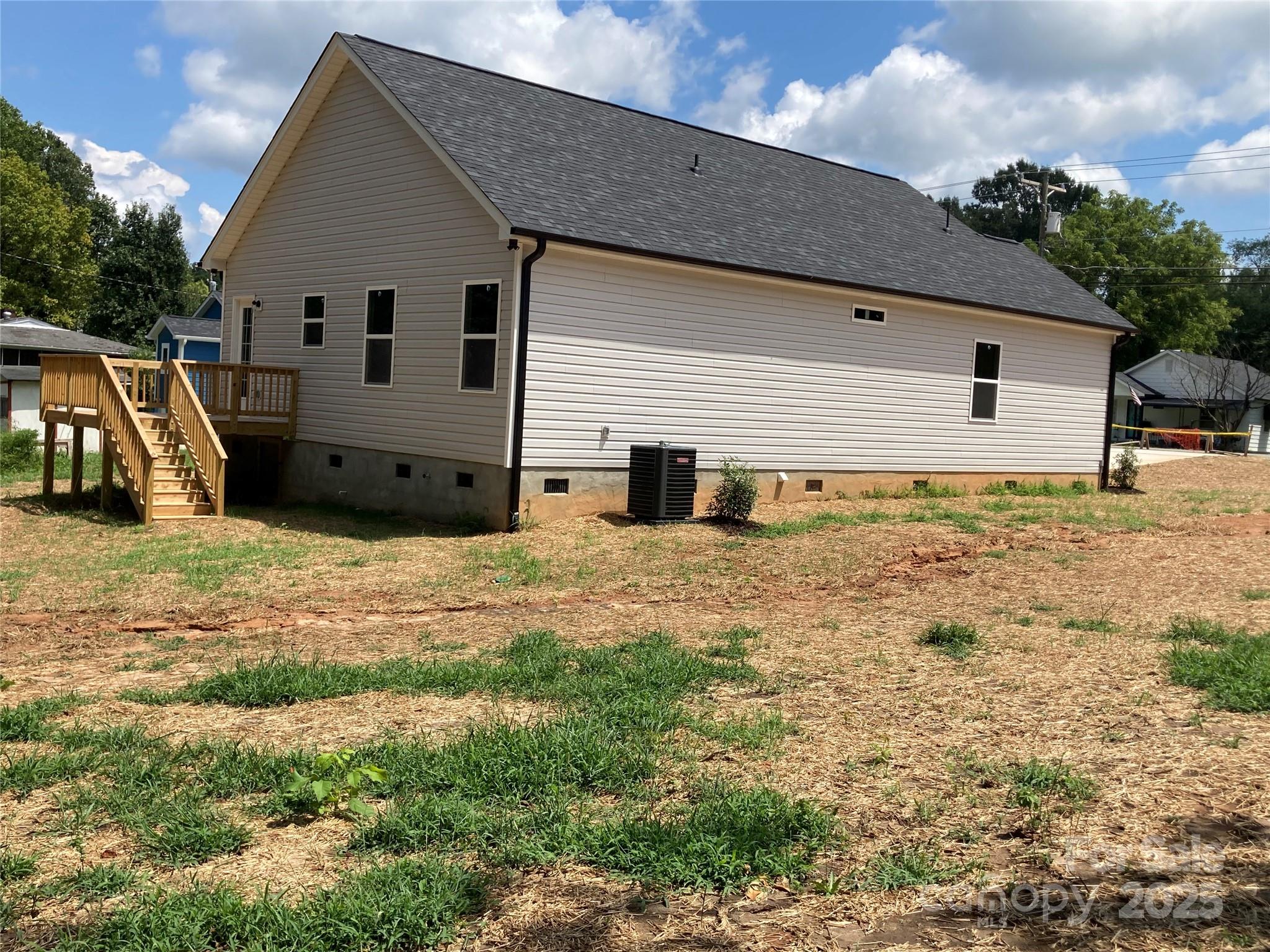 318 Davis Park Road Gastonia, NC 28052 - Photo 4 of 24 a view of a house with backyard
