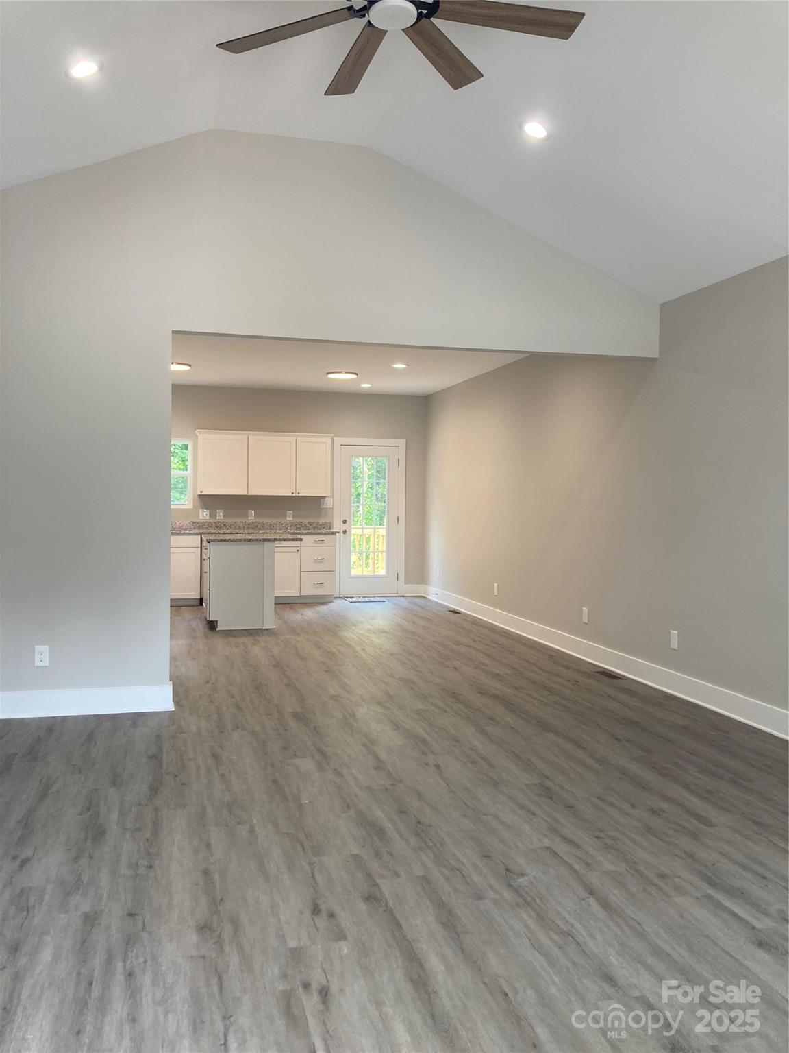 318 Davis Park Road Gastonia, NC 28052 - Photo 6 of 24 wooden floor in an empty room with a window